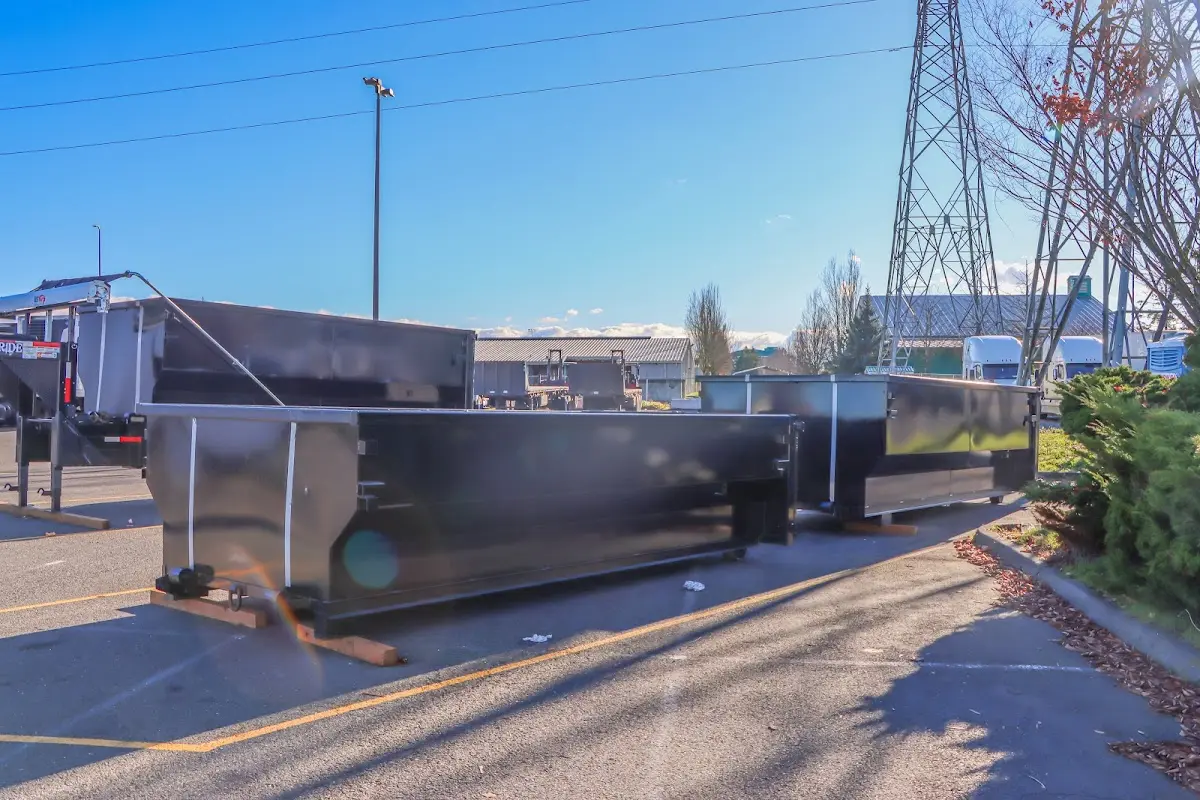 Roll-off dumpster ready for waste disposal at job site for Demolition Dumpster Rental in Pine Hills